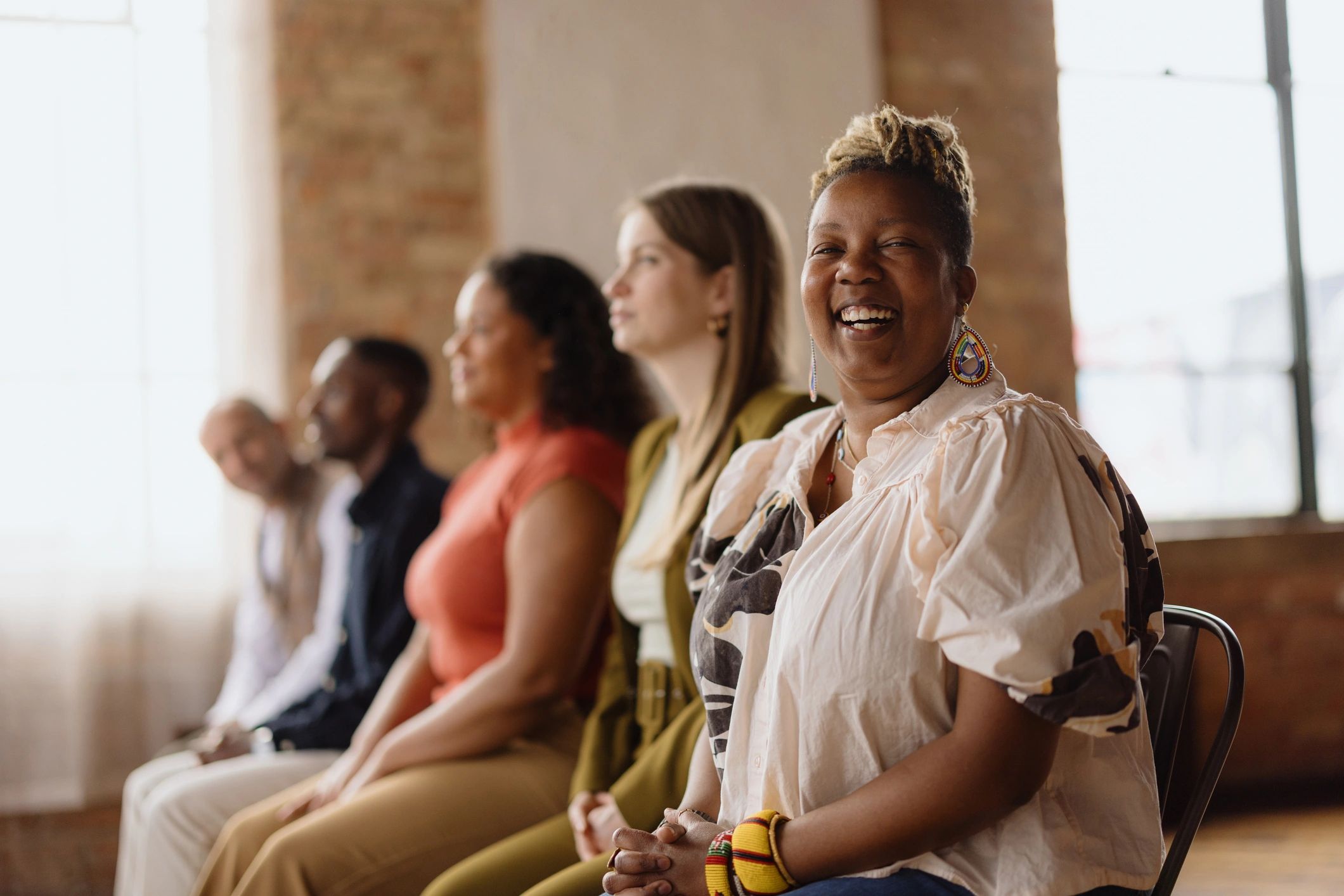 Executive team conversation during a meeting